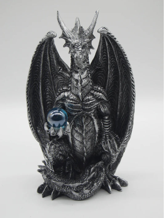 Silver Dragon Holding Blue Orb